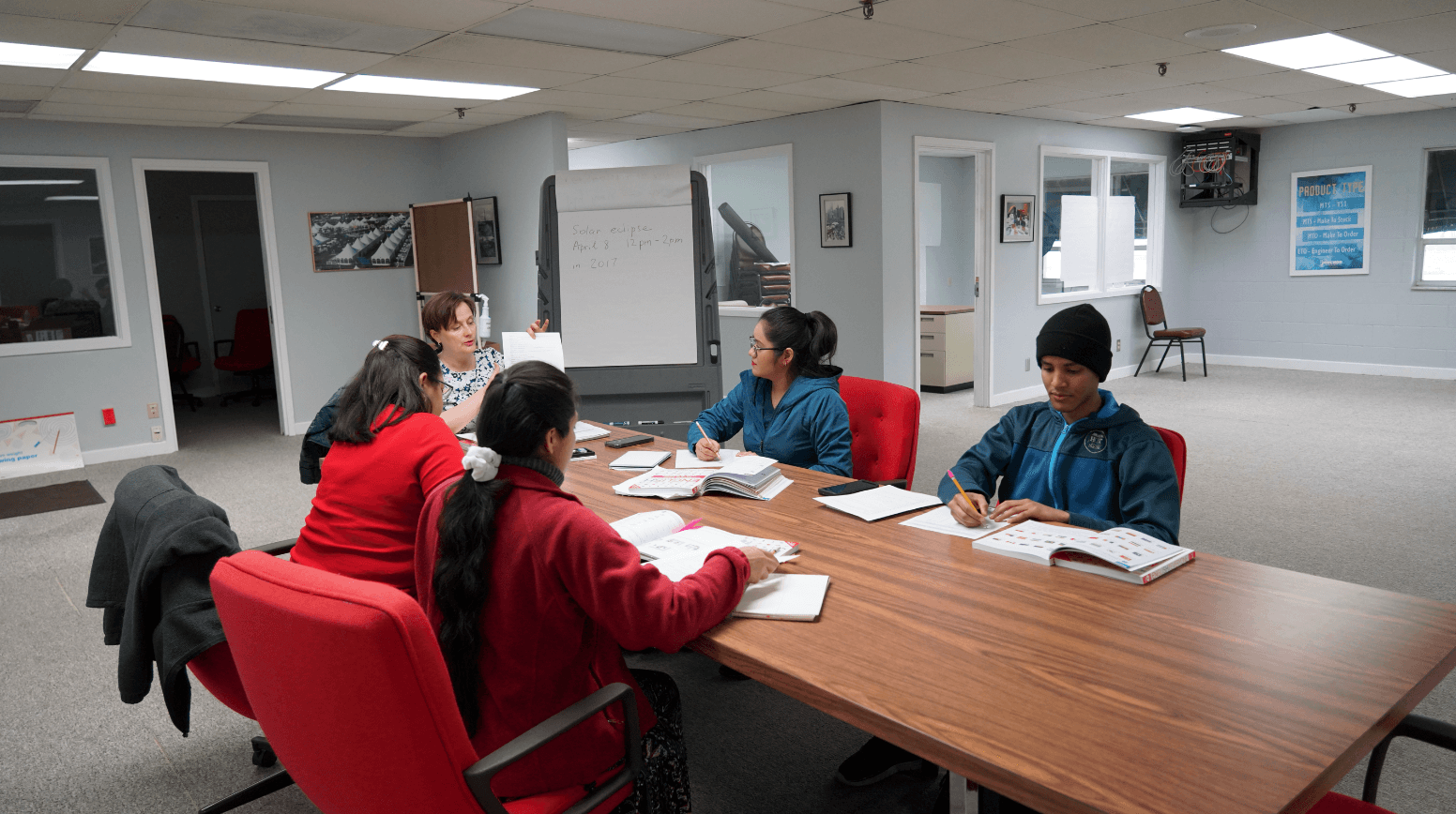 Instructor-led corporate language training in a small group classroom