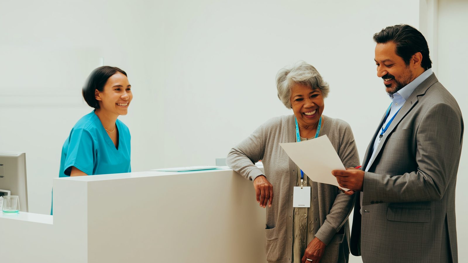 Clinic staff in Indiana reviewing a translated patient record with an interpreter