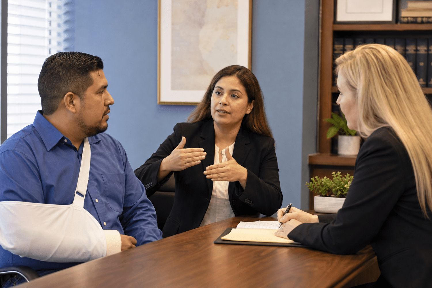 Workers compensation interpreters Indiana — certified interpreter assisting injured worker at law office in Evansville